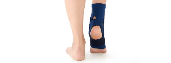 Cross strap ankle support with stays for sprains