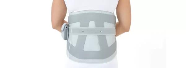 Lumbar orthosis brace with inflatable compression for pain